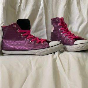 Shiny pink and black Converse high tops
